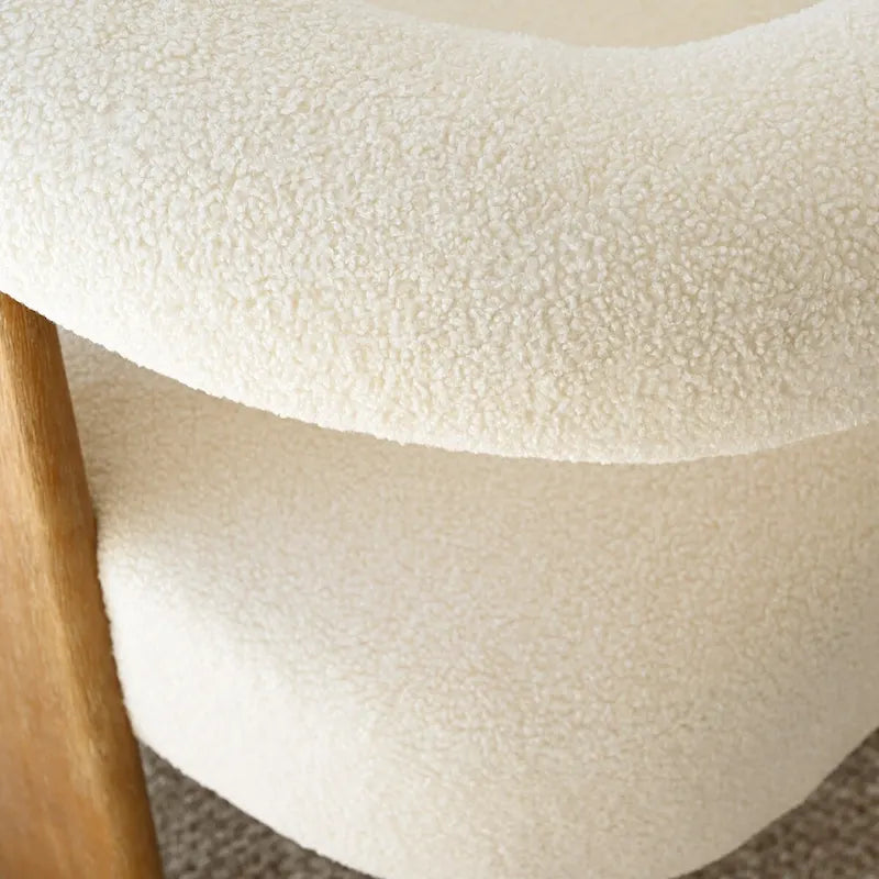 Gepolsterter Bouclé-Sessel